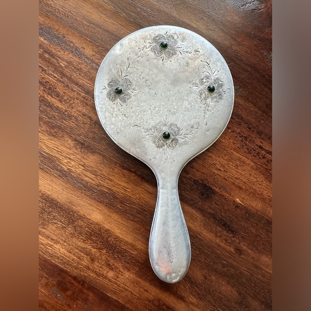 Vintage hand mirror with green embellishments etched metal